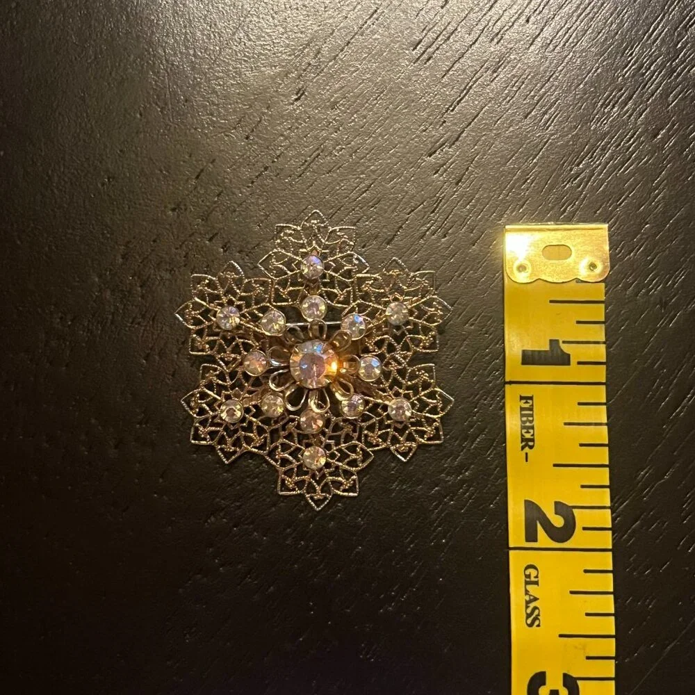 Vintage Gold Tone Snowflake Brooch with Aurora Borealis Rhinestones AB